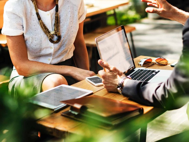 two-business-people-meeting-outside